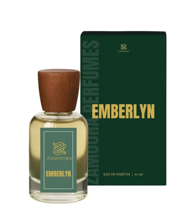 Zamoora Emberlyn perfume bottle for women displayed on gemstones with a teal background, featuring top notes of bergamot, blood orange and pink pepper, heart notes of jasmine blossom, honey and peony, and base notes of amberwood, vanilla and white musk
