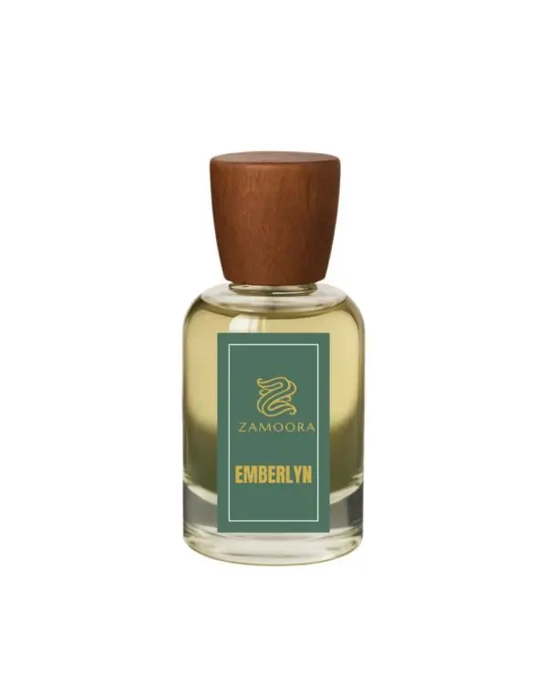 Zamoora Emberlyn perfume bottle for women displayed on gemstones with a teal background, featuring top notes of bergamot, blood orange and pink pepper, heart notes of jasmine blossom, honey and peony, and base notes of amberwood, vanilla and white musk