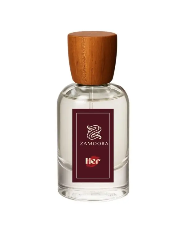Zamoora HER perfume bottle for women placed among pink flowers with a purple background, highlighting fruity top notes of strawberry, raspberry, blackberry, sour cherry, black currant, mandarin orange and lemon, a heart note of violet jasmine, and base notes of musk, vanilla, cashmeran, woody notes, amber, oakmoss and patchoulI.