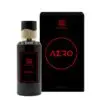 Zamoora Aero men’s perfume bottle displayed on a light wooden stand against a bold red background, featuring top notes of watermelon, red fruits, lavender and Sicilian orange, heart notes of lily of the valley, lotus and jasmine, and base notes of sandalwood, white musk and ambroxan.