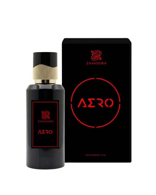 Zamoora Aero men’s perfume bottle displayed on a light wooden stand against a bold red background, featuring top notes of watermelon, red fruits, lavender and Sicilian orange, heart notes of lily of the valley, lotus and jasmine, and base notes of sandalwood, white musk and ambroxan.